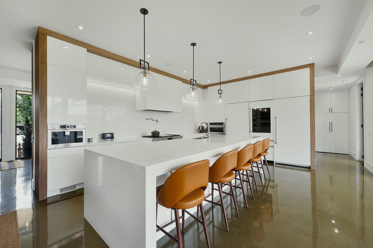 Designer kitchen with island real estate photo