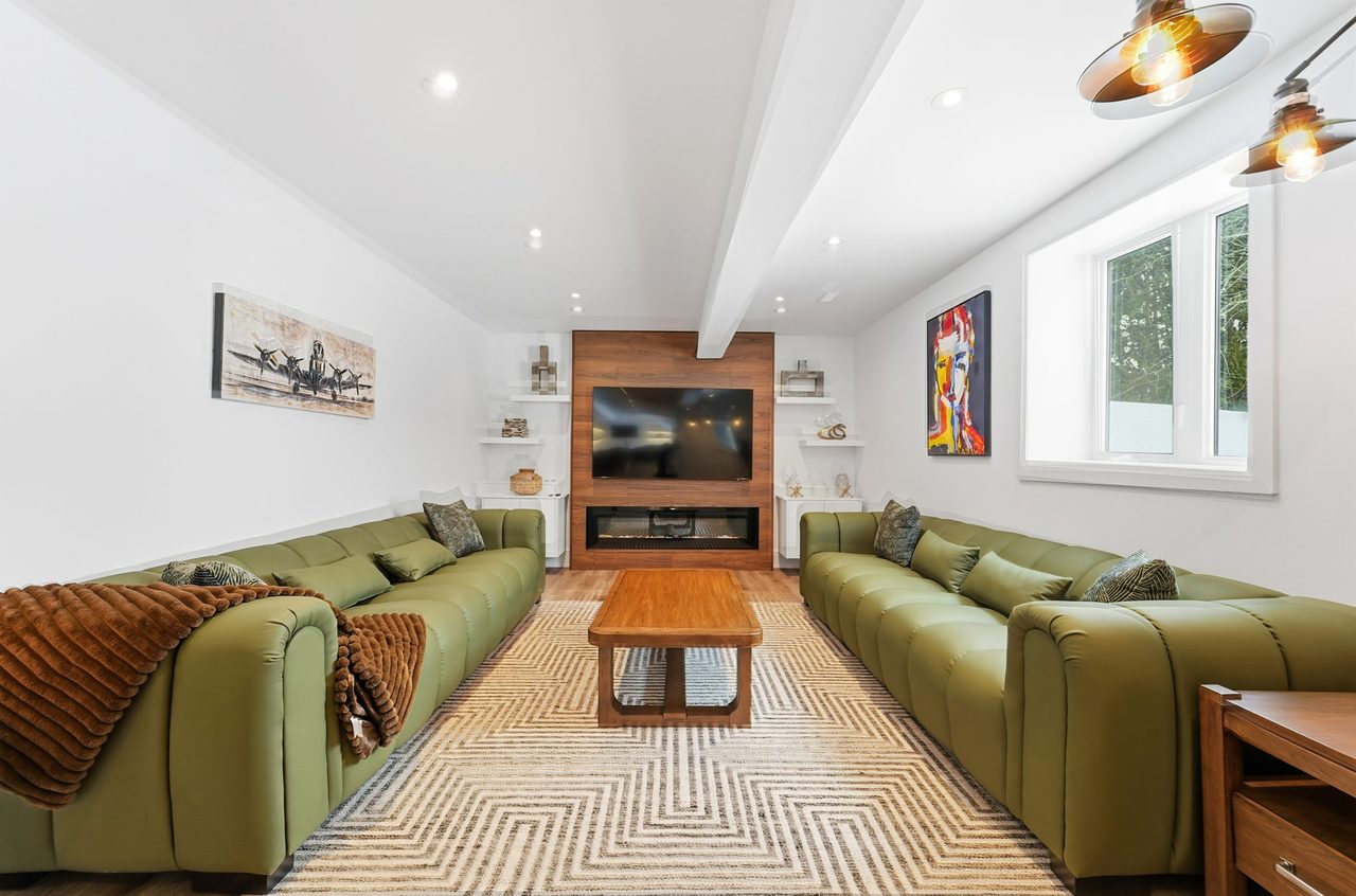 Great room with vaulted ceiling and fireplace