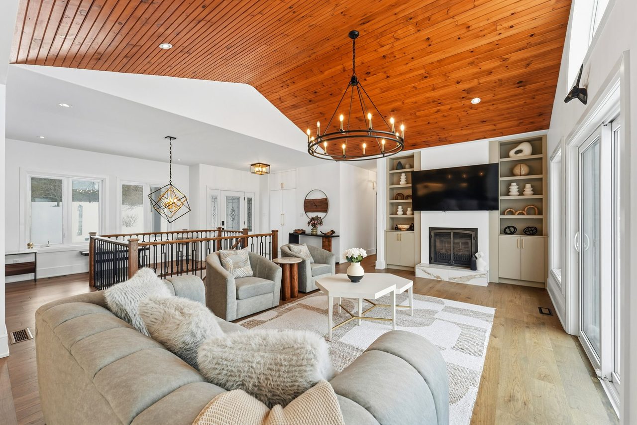 Living room with vaulted wood ceiling