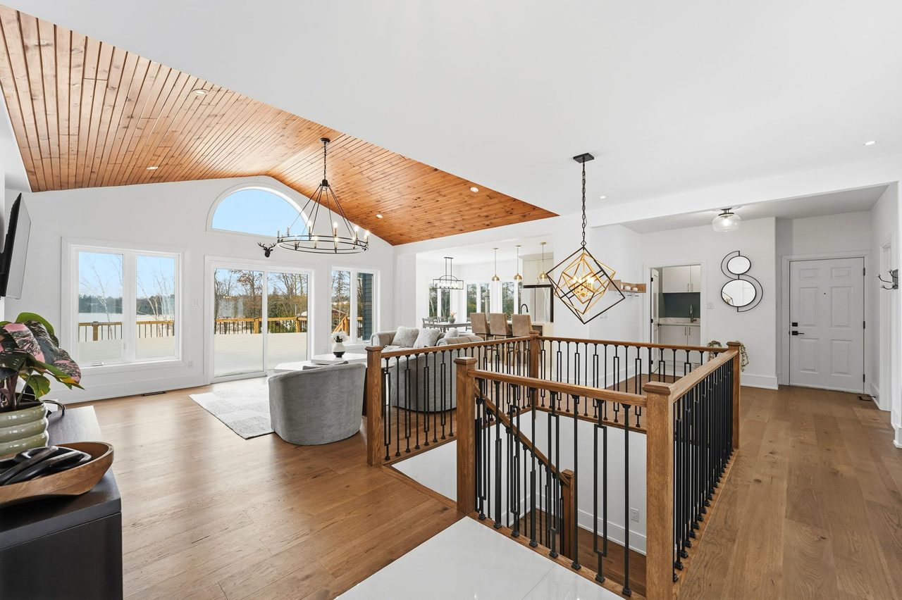 Open-concept main floor with wood ceiling